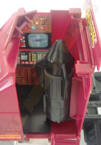 Kenner M.A.S.K. Rhino Dark gray missile launchiner. This was on very early toys. Later Rhino had the missile launchiner in red.